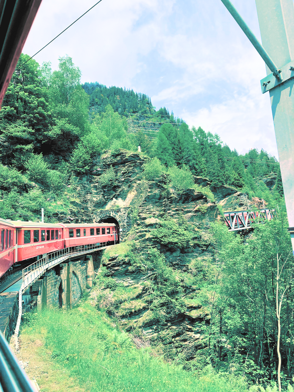 Panoramic ride on Bernina Red Train to visit St. Moritz